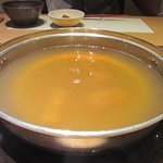 臼杵ふぐ 山田屋 西麻布 - 黄金色のふぐしゃぶスープ