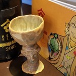 日本料理 TOBIUME - お酒⑥NEXT5　Hyougemono　2018　純米大吟醸酒(秋田)
      ラベルの腹黒いお侍さんの表情がまた良いです♪