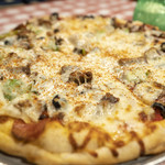 Filippi's Pizza Grotto - スペシャルピザ21.5ドル。