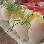 びすとろ UOKIN - 2011/09 ＵＯＫＩＮ名物 海の幸のカルパッチョ(カンパチ・活ダコ・カツオ・サンマ・甘エビ・平貝)(６８０円)。