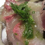 びすとろ UOKIN - 2011/09 ＵＯＫＩＮ名物 海の幸のカルパッチョ(カンパチ)。