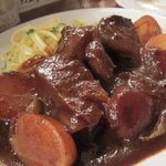 びすとろ UOKIN - 2011/09 牛ほほ肉の赤ワイン煮 ほろほろの牛ほほ肉をヌイユ(平打ちパスタ)にからめてお食べ下さい(９８０円)。