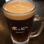 ゴールデンもつ - 黒生ホッピー泡部分