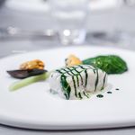 ASAHINA Gastronome - 活ヒラスズキ　ブルターニュ産ムール貝のヴルーテでコーティング 　ロメインレタスのファルシーを添えて