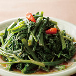 Stir-fried seasonal green vegetables