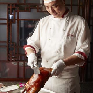 Peking duck prepared by a professional chef using the same cooking method as authentic Beijing Quanjude