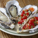 Steamed Oyster topped with fresh tomatoes