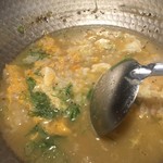 鳥田中 - 締めの締めで丹波地鶏の卵雑炊です　そーっとゆっくり混ぜ合わせて美味しくなるのを待ちます