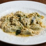 - Tortelli stuffed with spinach and ricotta cheese