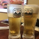 Isomaru - 生ビール。ツレが飲んでからの写真w