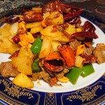 ウイグルアパンディンキッチン - ・金蓑炒肉 裏はそんなに赤く無い