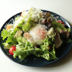 Caesar salad with soft-boiled eggs and bacon