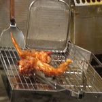 居酒屋 みえ蔵 - 隣の客の大手羽