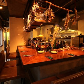 Theater-style counter seats with a full view of the cooking process