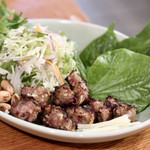 酒とタイ料理 ピッサヌローク - 自家製発酵ソーセージ（ネームヤーン）