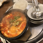 塩ホルモン 炭火のあんざい - 豆腐チゲ