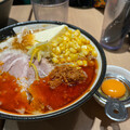 のりくむ